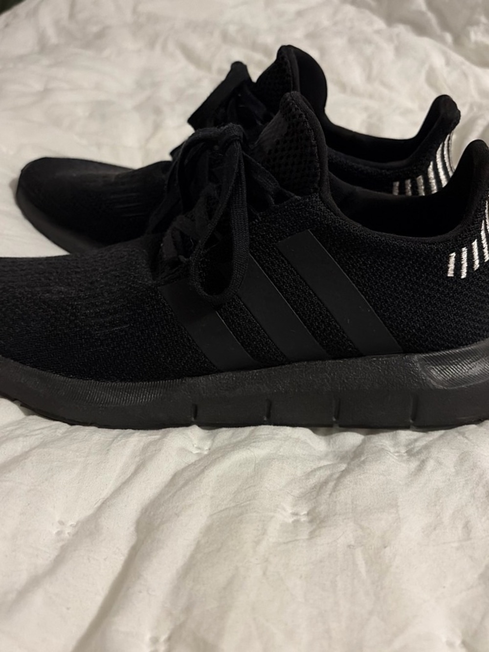 adidas All-Black Knit Running Shoes with Subtle Heel Stripes